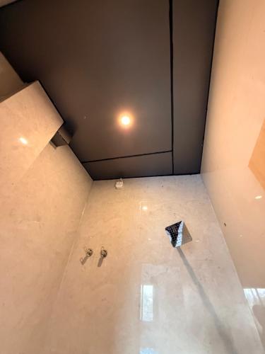 an overhead view of a room with a ceiling at Sunrise stay in Chhatikara
