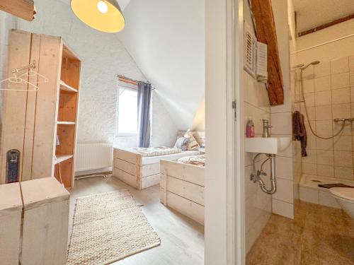 a bathroom with a sink and a toilet and a tub at Quelle in Bernkastel-Kues
