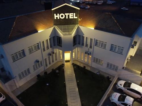 an overhead view of a hotel at night at Nap Hotel in Ponta Grossa