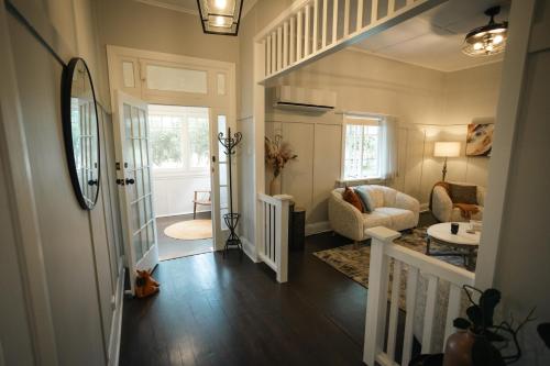 a hallway of a home with a living room at The Foxman Cottage in Broke
