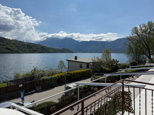 a view of a lake with mountains in the background at Albergo Mezzolago in Calceranica al Lago