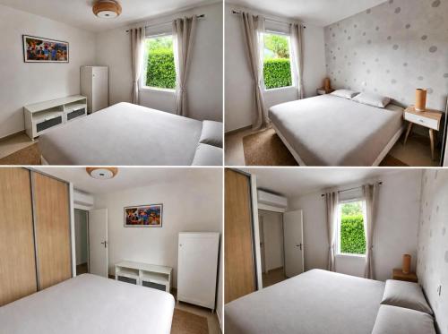 a room with two beds and a table and a refrigerator at Villa 2 étoiles Etxe Xumea in Aldudes
