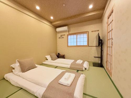 到难波4分钟 机场直达 通天阁 心斋桥 梅田 Usj14分 全新日式 2房1厅1厨2卫2浴 最多5人