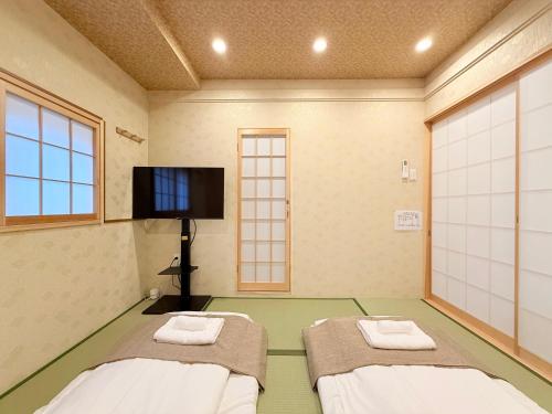 到难波4分钟 机场直达 通天阁 心斋桥 梅田 Usj14分 全新日式 2房1厅1厨2卫2浴 最多5人