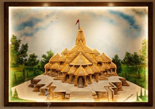 a painting of a building in a picture frame at Hotel Sooryavanshi in Ayodhya