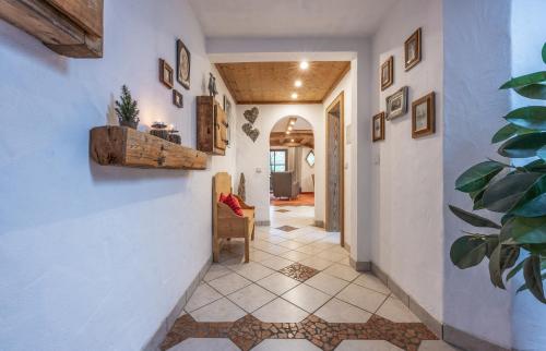 a hallway of a home with white walls at Das Landhaus in Pfronten
