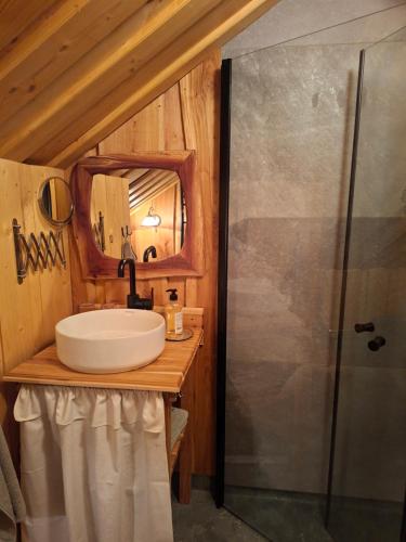 a bathroom with a sink and a shower at Stastugan in Grönhult