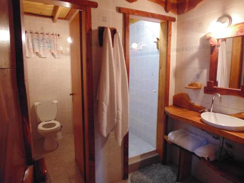 Ванная комната в Alpina Cabañas