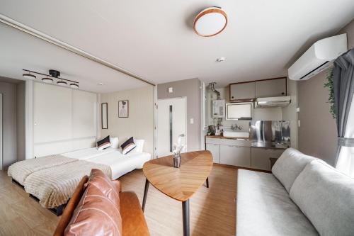 Den SUSUKINO ROOMS