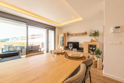 2BR Apt with Terrace & Parking, Near Beach & Town