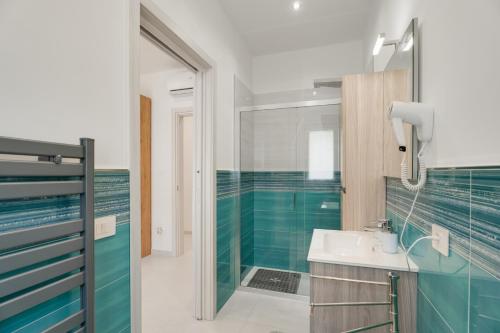 a bathroom with a sink and a shower at B&B Santa Maria in Agerola