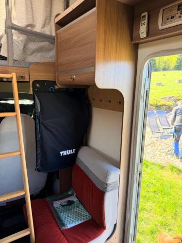 a small room in the back of a camper van at Obytňák Bohoušek in Pulečný