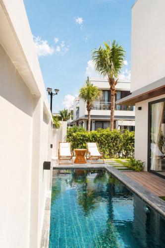an image of a swimming pool in a house at Sea La Vie Beachfront Villa - Bai Truong Beach Phu Quoc in Phú Quốc