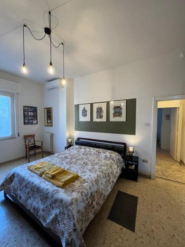 a bedroom with a large bed in a room at Alloggio Primavera in Terni