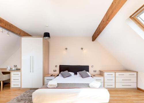 a bedroom with a bed and a desk at The Clubhouse in Sheffield