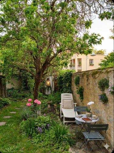 Appartement Lumineux avec Jardin Privatif