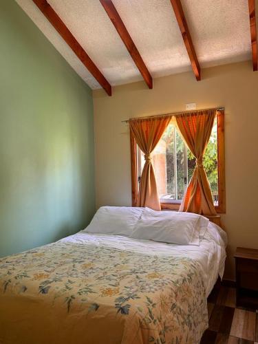 a bedroom with a bed and a window at Lanco in Lanco