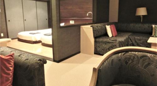 Una cama o camas en una habitación de Hotel Cypress Karuizawa