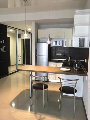 Dapur atau dapur kecil di Apartments on Kirova