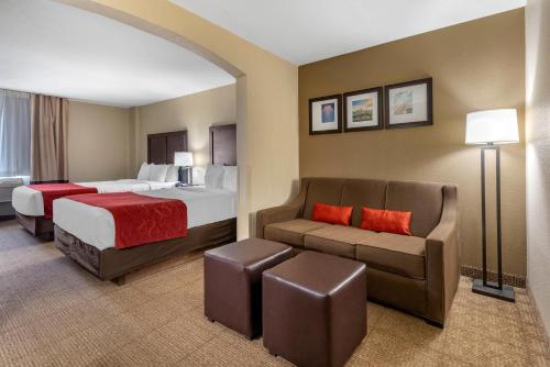 a hotel room with a bed and a couch at Comfort Suites Highlands Ranch Denver Tech Center Area in Highlands Ranch