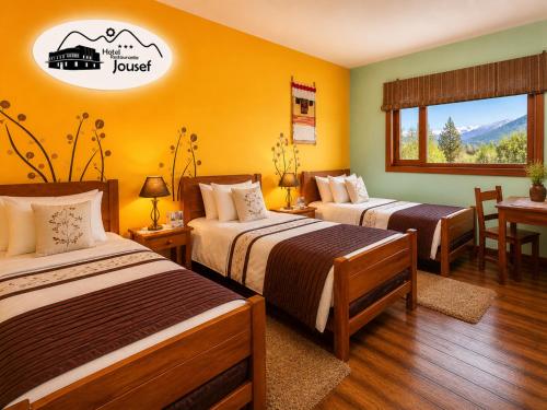 a hotel room with two beds in a room at Hotel Jousef in Puquio