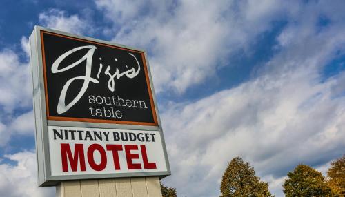 a sign for a motel on top of a building at Nittany Budget Motel in State College