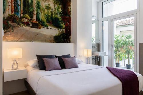 Foto FLORIT FLATS - Suite en el Caso Antiguo - Alojamiento Exclusivo 1