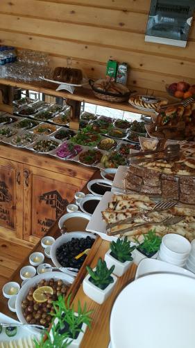a buffet of different types of food on a table at Kadıoğlu Konağı in Kastamonu