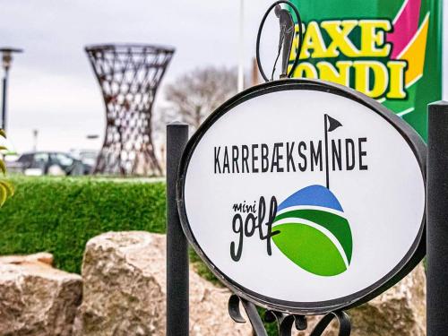 a sign for a keratectomniaomniaomnialedgedledgedledged at Holiday home on a holiday park in Karrebæksminde in Karrebæksminde