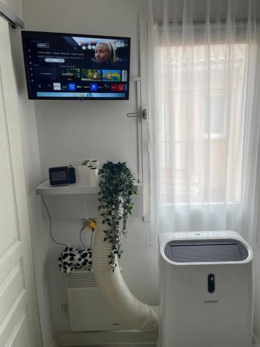 T2 climatisé wifi piscines parking