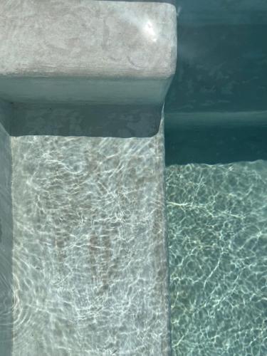 a close up of a pool of water at Ma'Bella - MASSERIA PICCOLA by Rentbeat in Cisternino