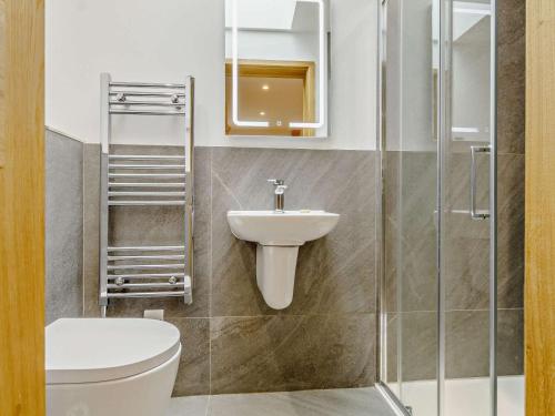 a bathroom with a toilet and a sink at 2 Bed in Taunton oc-80694 in North Curry