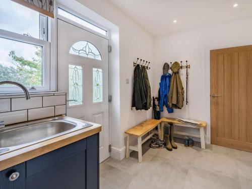 a kitchen with a sink and a window at 3 Bed in Poulton-le-fylde oc-83787 in Hambleton