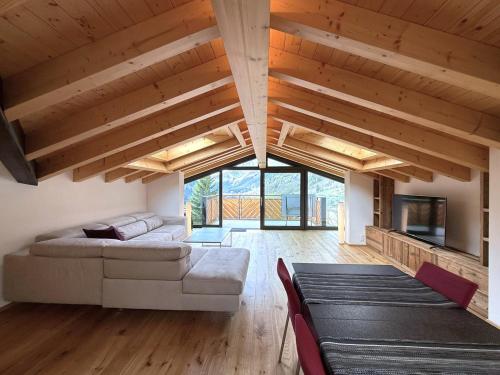 a living room with a couch and a table at Diana 9 in Leukerbad