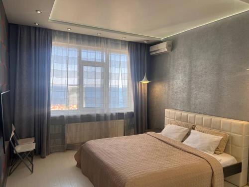 Krevet ili kreveti u jedinici u okviru objekta Horizon Hotel