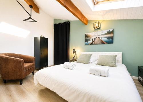 Llit o llits en una habitació de Le Duplex Lemon