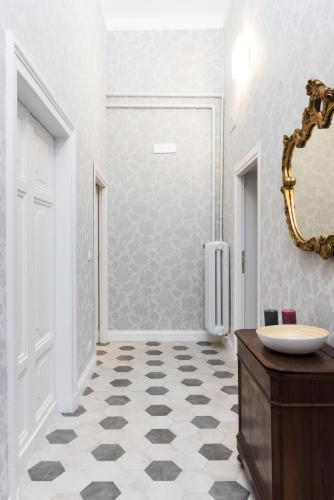 a bathroom with a sink and a mirror at Casa Minerva Al Pantheon in Rome
