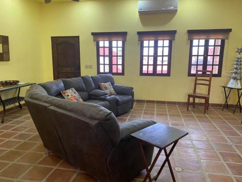 a living room with a couch and a table at Casa Serenidad familiar escapade in San Felipe