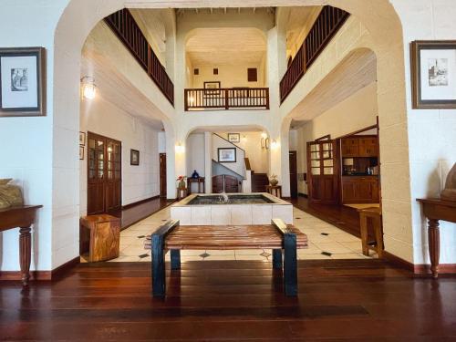 a large room with a table in the middle of it at Villa Azulejo in Black Rock