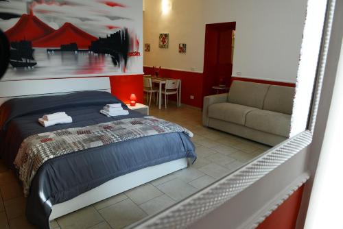En eller flere senger på et rom på B&B La Torretta Chiaia