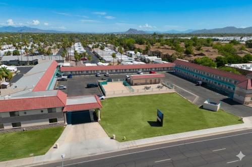an aerial view of a campus with a park at Superior Suites Phoenix Mesa in Mesa