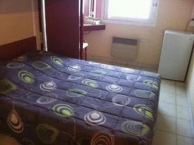 Postel nebo postele na pokoji v ubytování Lemon Hôtel Avignon Rochefort