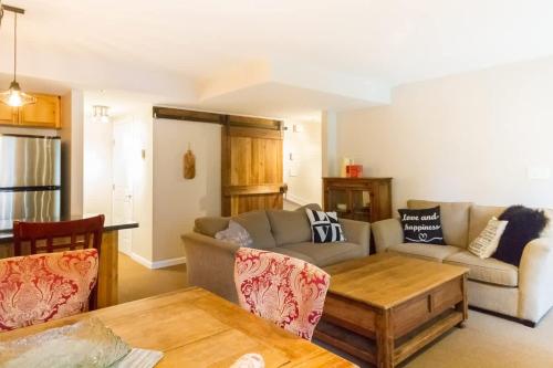 a living room with a couch and a table at 09 Valhalla in Whistler