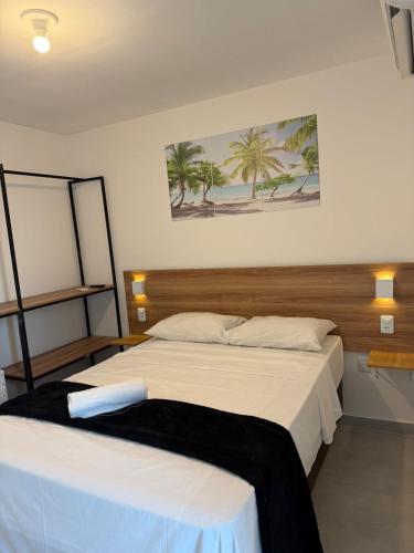 zwei Betten stehen nebeneinander in einem Schlafzimmer in der Unterkunft Hotel Pousada Sol Beira-mar in Natal