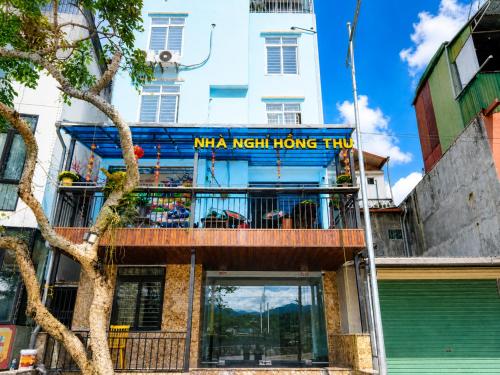a building with a sign that reads mma night home inn at Hồng Thu Hotel Cao Bằng in Cao Bằng