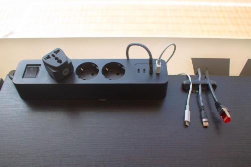 a electronic device sitting on top of a table at Hostel Tropical Work in Las Palmas de Gran Canaria