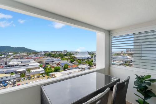a balcony with a view of a city at Peak Studio - Highview Haven across Shopping Centre in Cairns