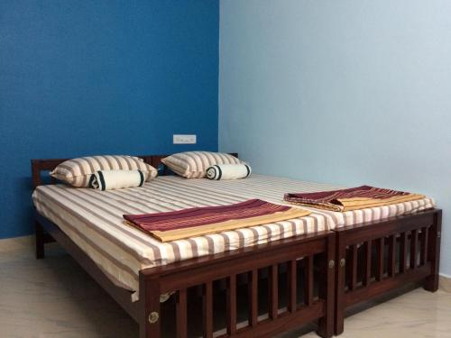 Postel nebo postele na pokoji v ubytování Cherish homestay