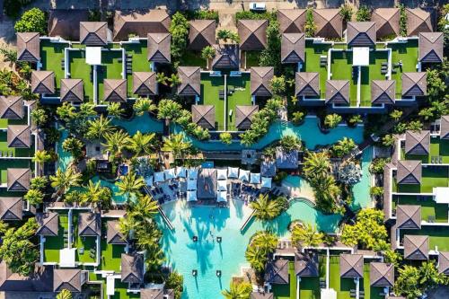 an aerial view of a resort with a swimming pool at 'Saltwater Studio' Experience Resort-style Bliss in Craiglie