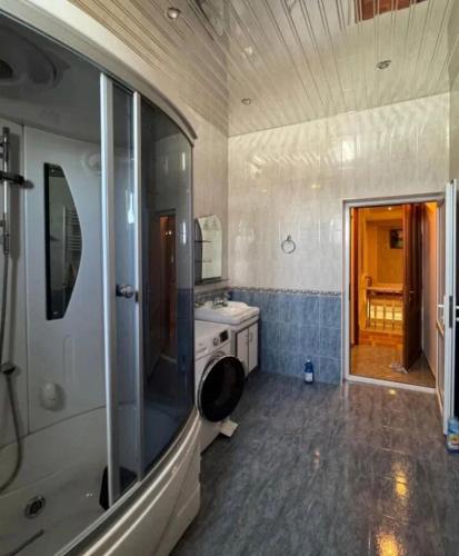 a bathroom with a sink and a toilet and a shower at Sirik guest house in Geghanist